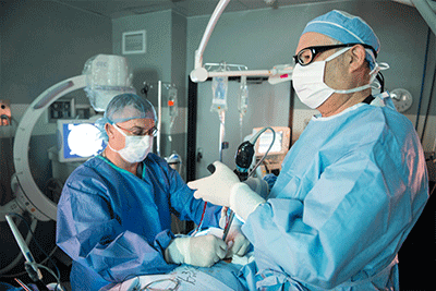 spinal-hardware-removal-fbss Doctors remove spinal hardware from a failed back surgery