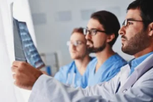 Surgeons Review Imaging at Bonati Spine Institute in Hudson, FL